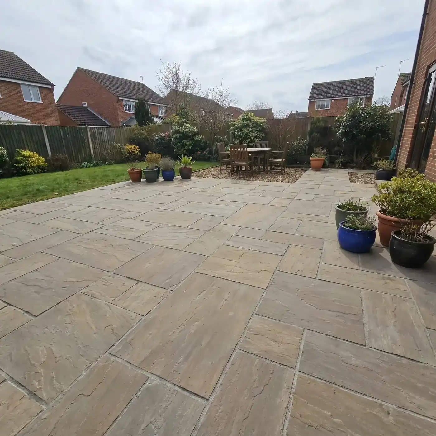 Indian Stone vs Porcelain Patios: How Cleaning Differs